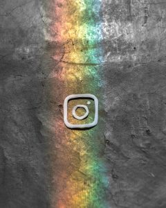 MoxiWorks Instagram Ads - rainbow in background with instagram logo