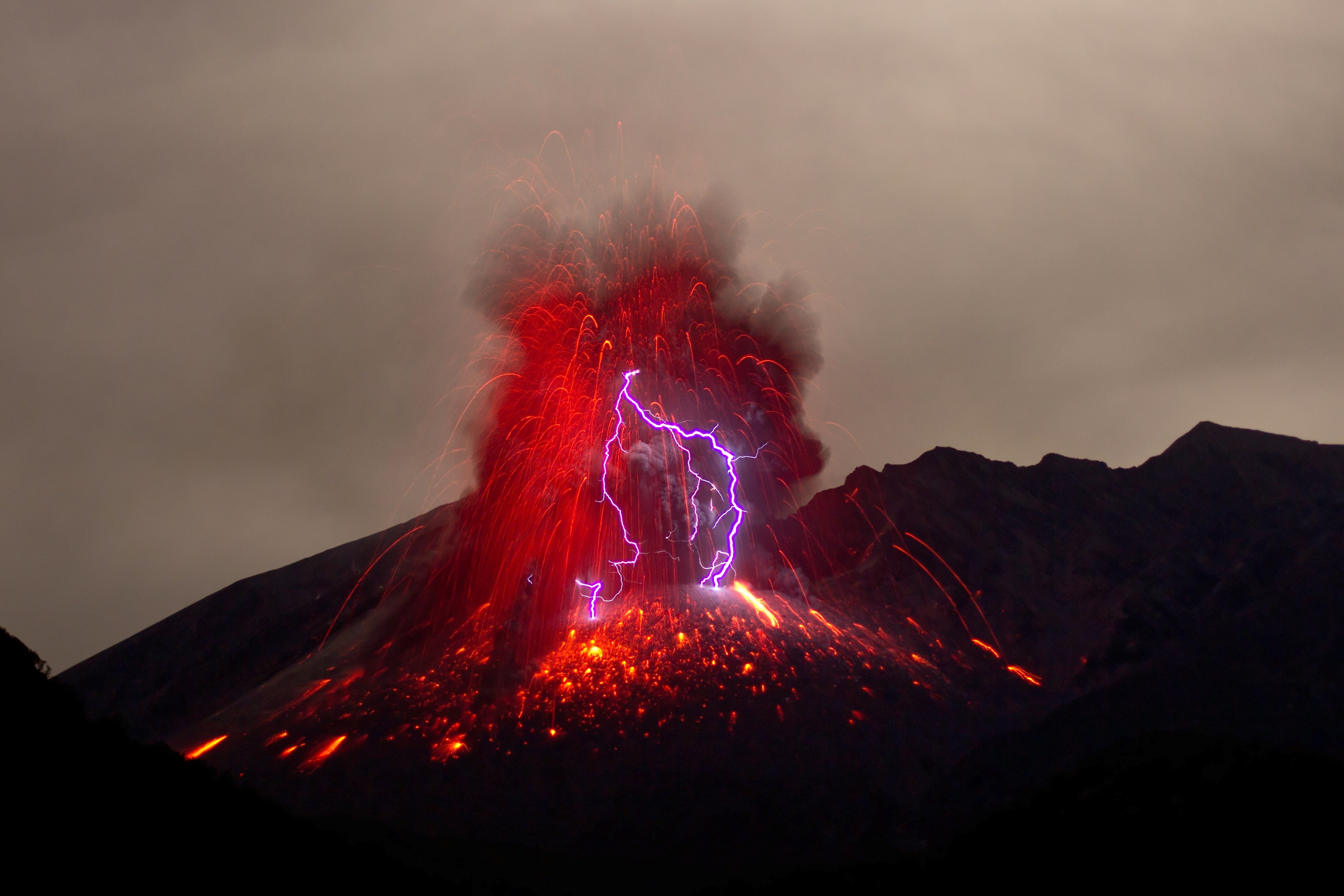 image of volcano erupting electricity